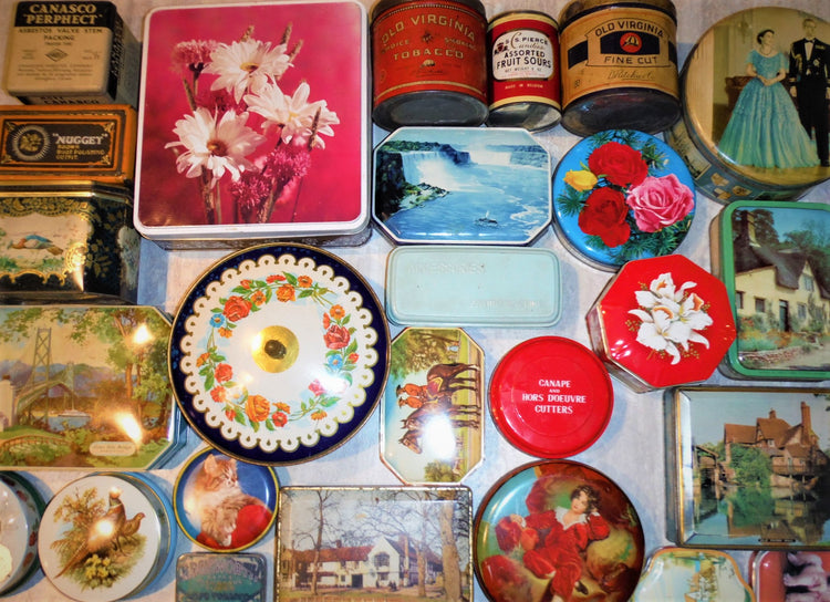 The photo image is of various vintage tin cans and containers, including royalty tins, souvenir tins, biscuit tins, candy tins, and many other varieties of collectible tin can containers!