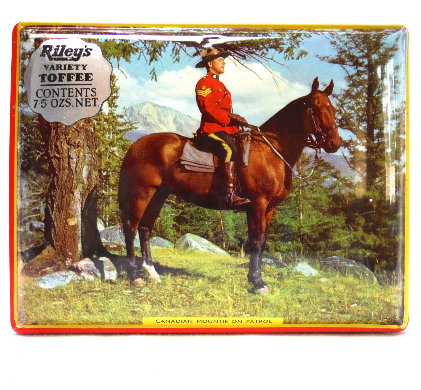 Vintage Tin by Riley's Toffee of Halifax, England: 'CANADIAN MOUNTIE ON PATROL'