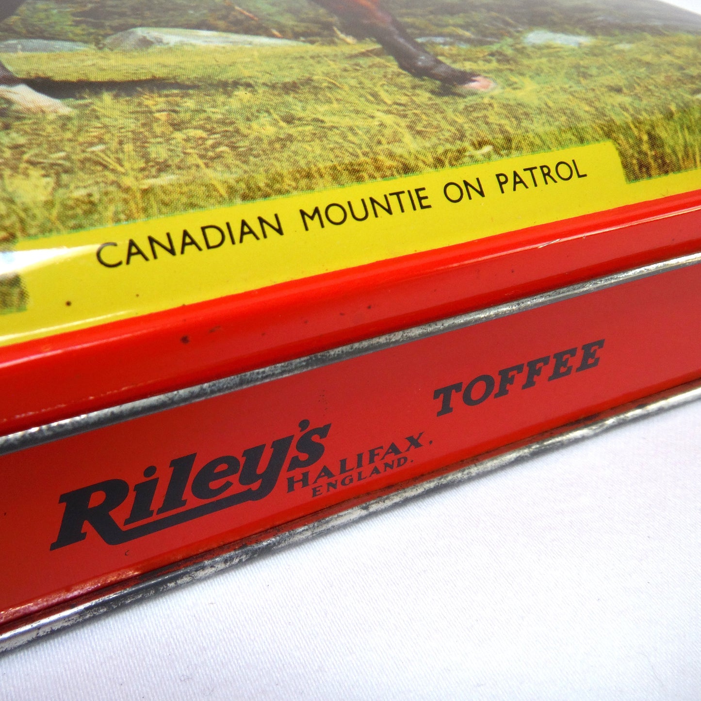 Vintage Tin by Riley's Toffee of Halifax, England: 'CANADIAN MOUNTIE ON PATROL'