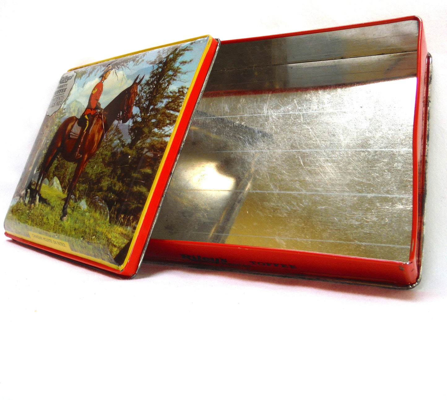 Vintage Tin by Riley's Toffee of Halifax, England: 'CANADIAN MOUNTIE ON PATROL'