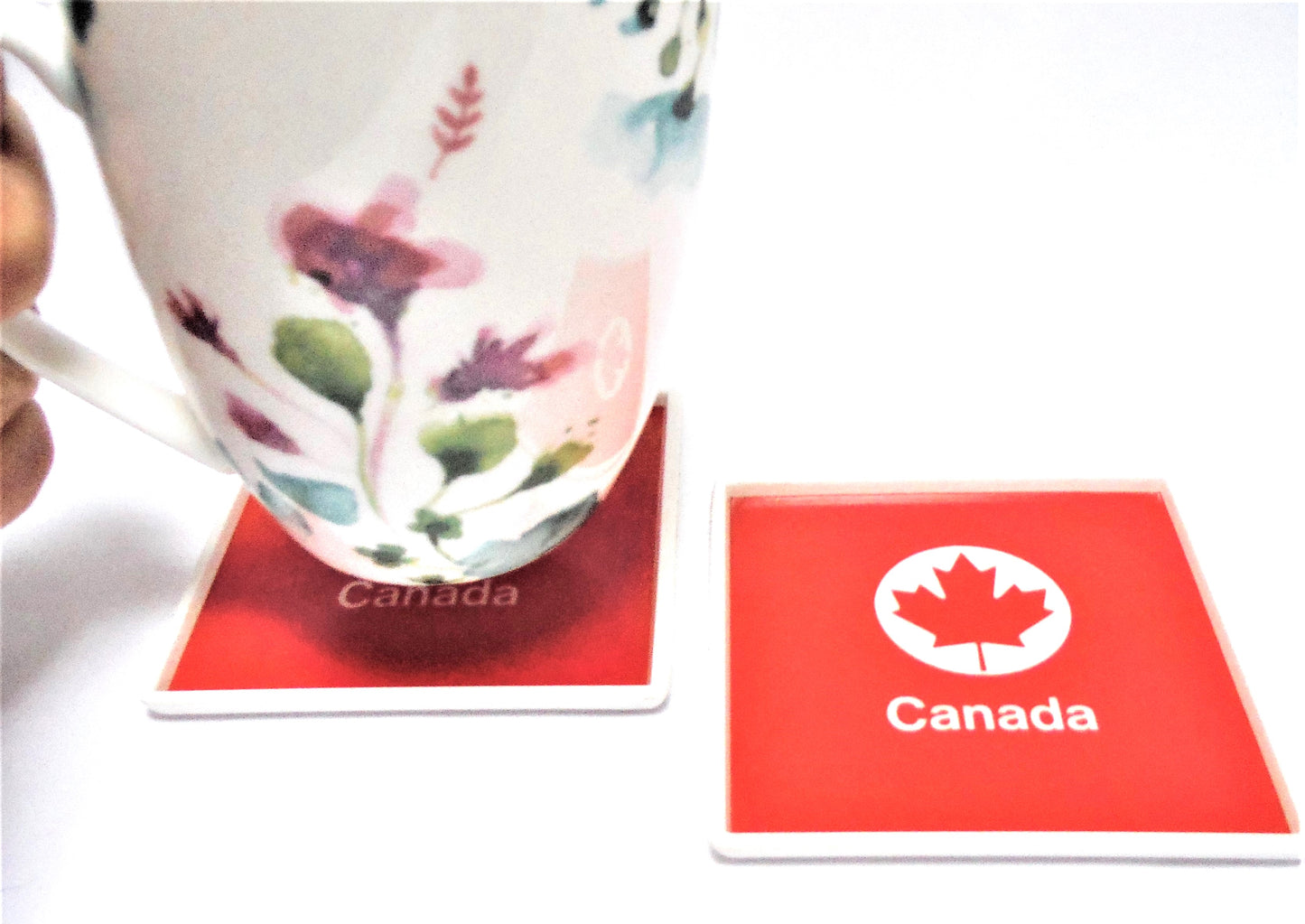Coasters, Vintage Set of 2, White ORNAMIN Plastic with Red Maple Leaf, Made in Canada 1970's