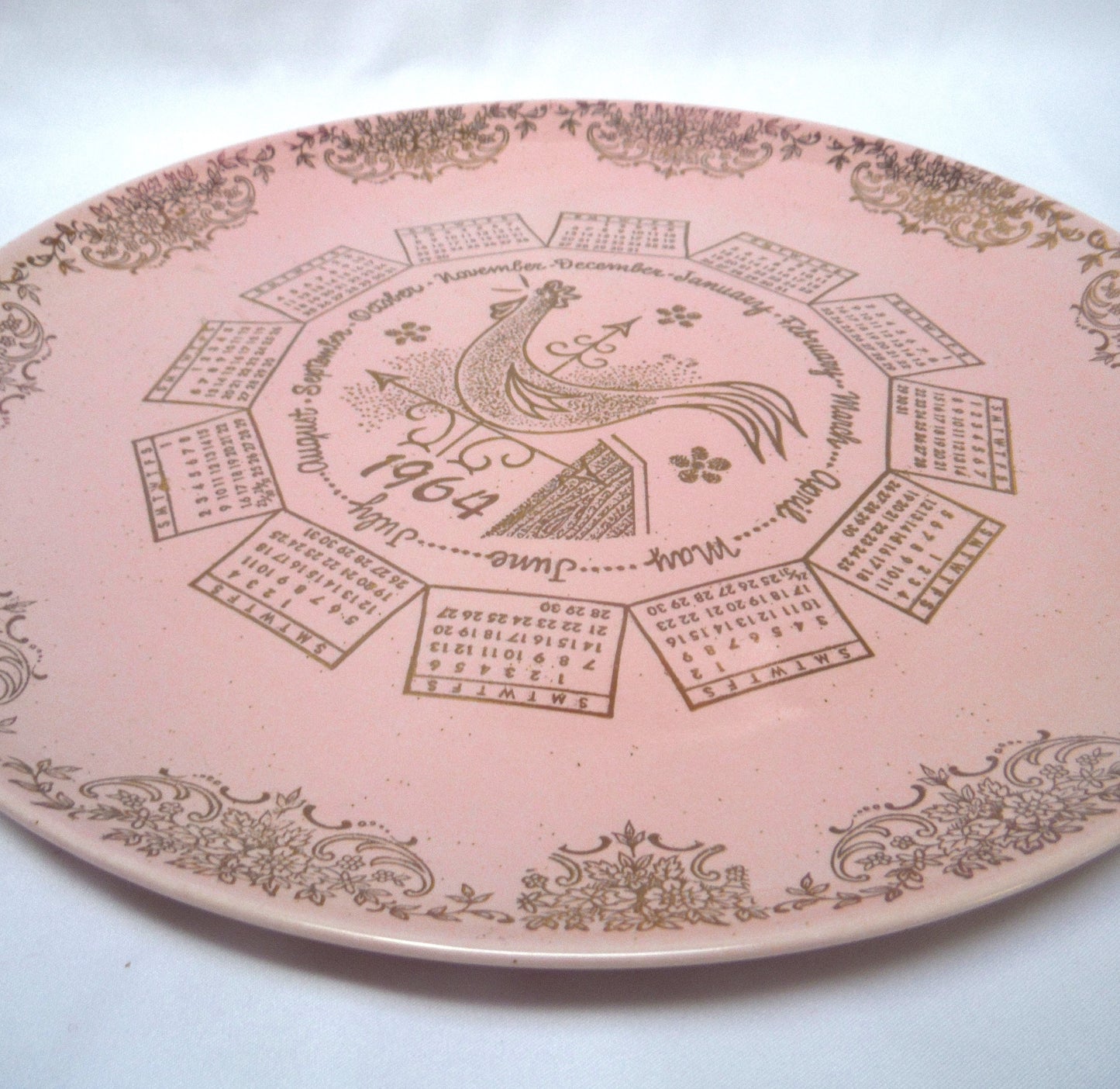 1964 Rare 'Barbie-Like' 10 inch Pink Taylor-Smith-Taylor Pebbleford Calendar Plate from Harburgers Jewelers of Cleveland, Ohio
