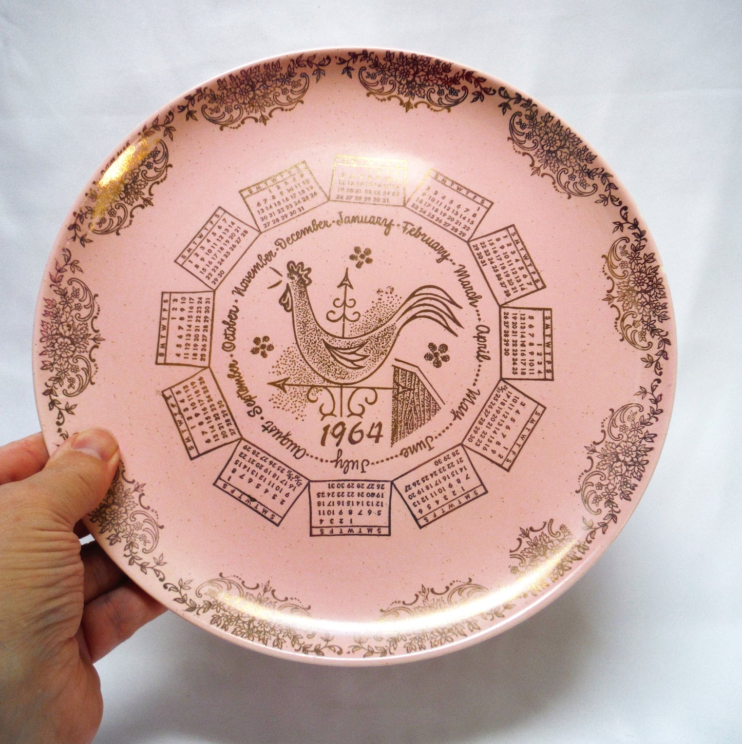 1964 Rare 'Barbie-Like' 10 inch Pink Taylor-Smith-Taylor Pebbleford Calendar Plate from Harburgers Jewelers of Cleveland, Ohio