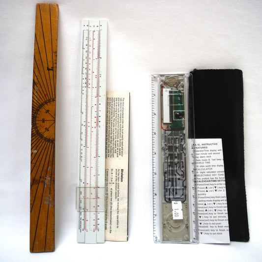 TRIO OF MEASURING DEVICES THROUGH THE AGES: Wood Ruler, Slide Ruler, and Electronic Ruler