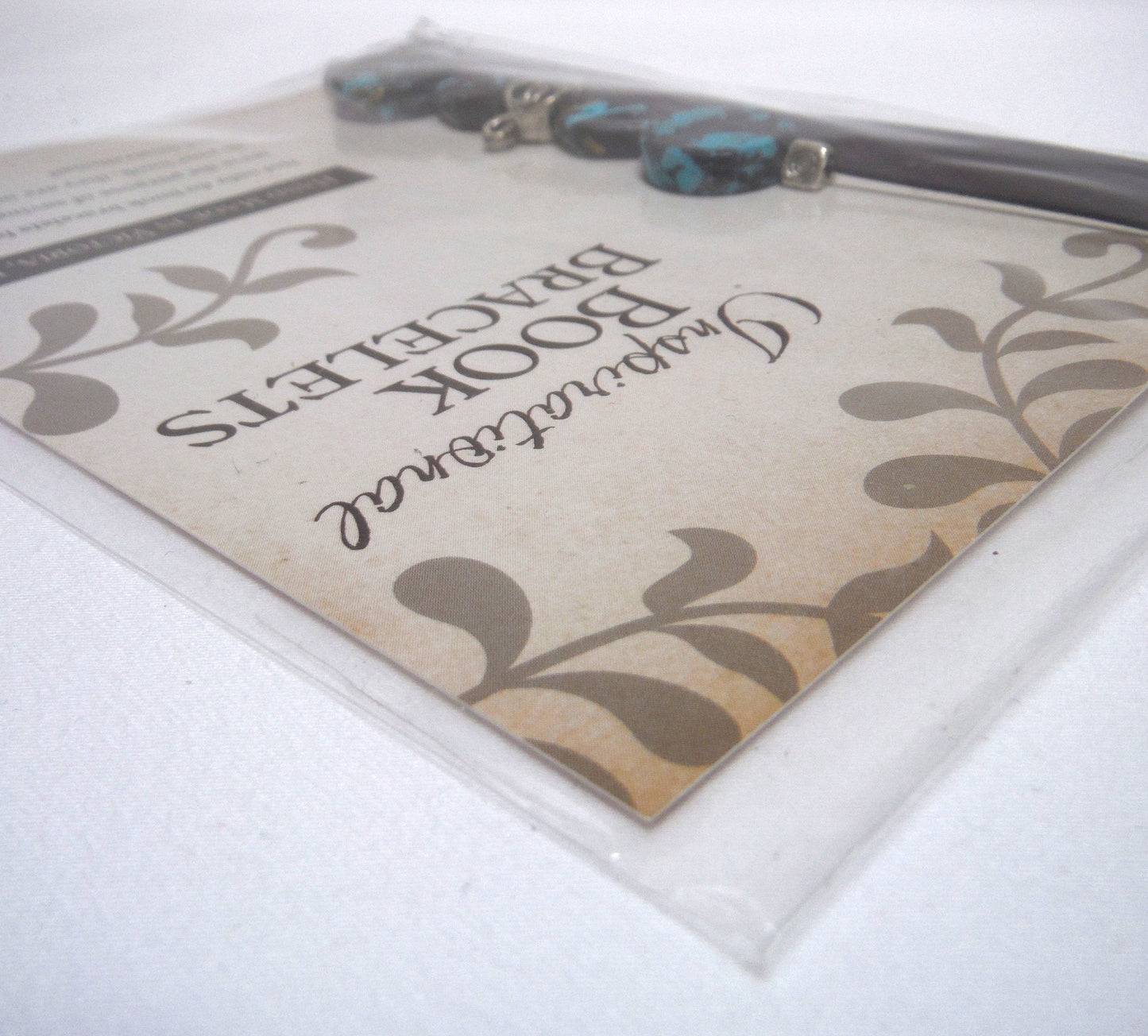 CONTEMPORARY INSPIRATIONAL BOOK BRACELET: Hand Made in Victoria, British Columbia: Aqua Blue and Black Beads with Silver Charms