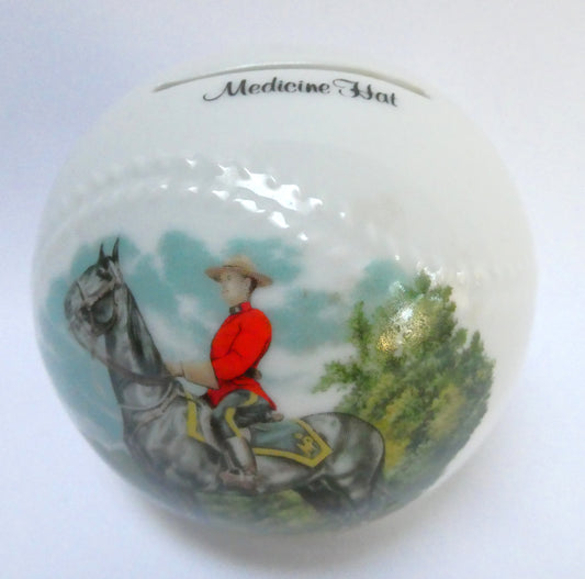 Vintage Ceramic White Baseball-Styled MEDICINE HAT MONEY BANK: Featuring The Royal Canadian Mounted Police (RCMP)