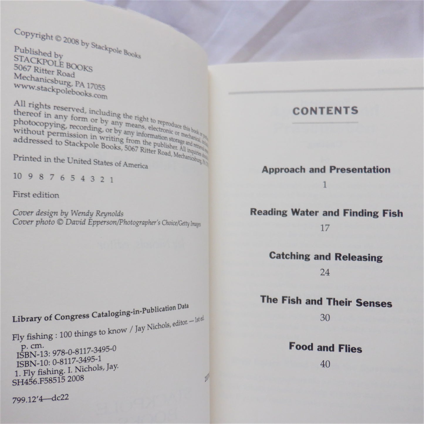 FLY FISHING...100 THINGS TO KNOW, by Jay Nichols, (2008 1st Ed.)