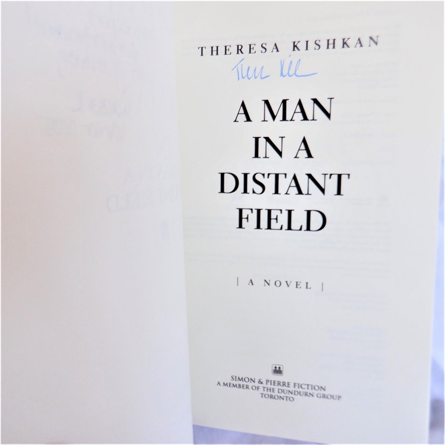 A MAN IN A DISTANT FIELD, A Novel by Therese Kishkan (1st Ed. SIGNED)