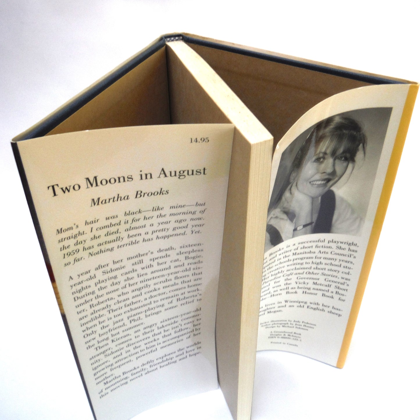 TWO MOONS IN AUGUST, A Novel by Martha Brooks (1st Ed. SIGNED)
