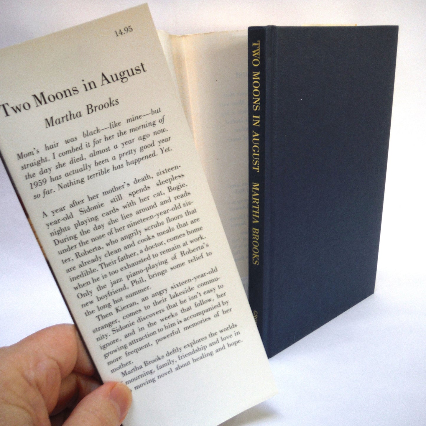 TWO MOONS IN AUGUST, A Novel by Martha Brooks (1st Ed. SIGNED)
