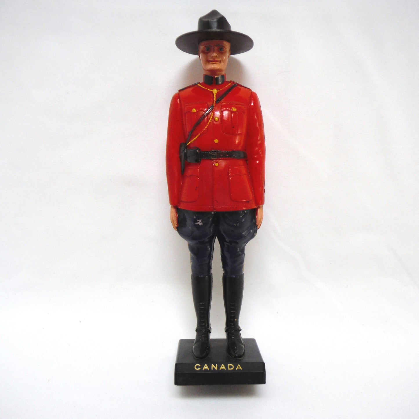 RCMP MOUNTIE No. 205: "CANADA" Tall Red Plastic Statue of Canada's Finest! Made in Hong Kong