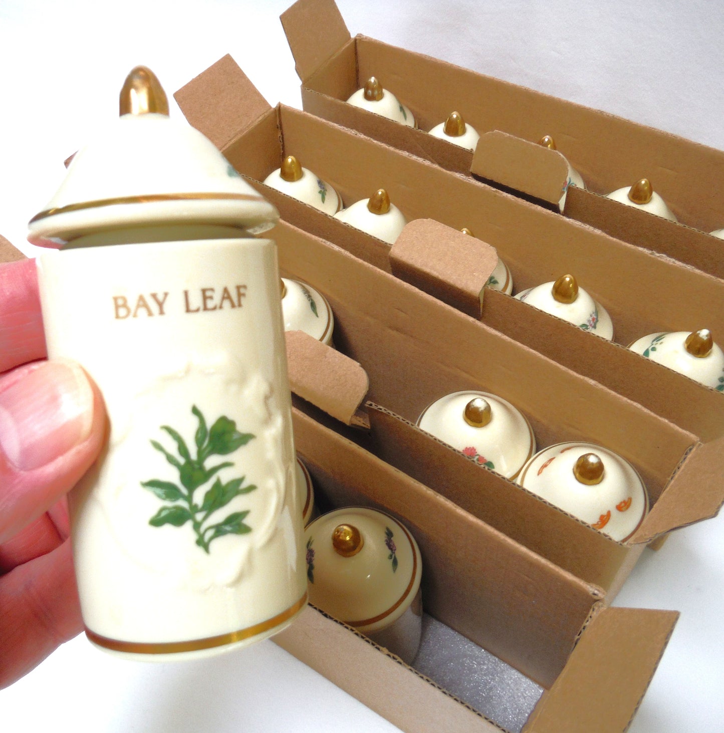VINTAGE LENOX SPICE GARDEN SPICE JARS: Set of 19 Spice Jars, Crafted of fine Porcelain, Sculpted in Bas-relief, decorated by hand and embellished with 24K Gold.