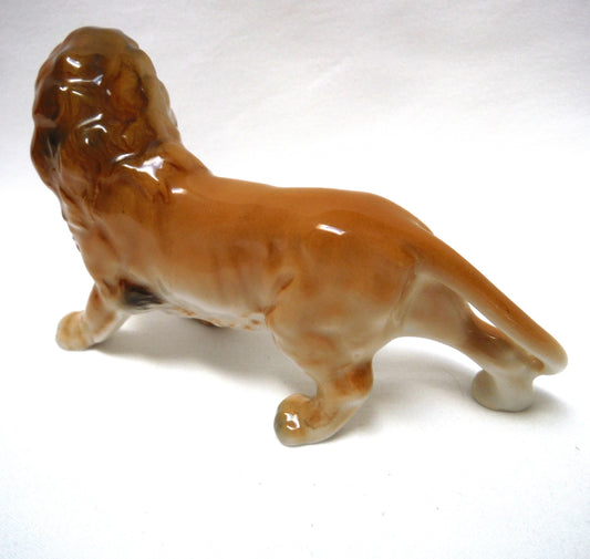 Vintage Porcelain Hand-Decorated Lion Pouncing Statue Figurine