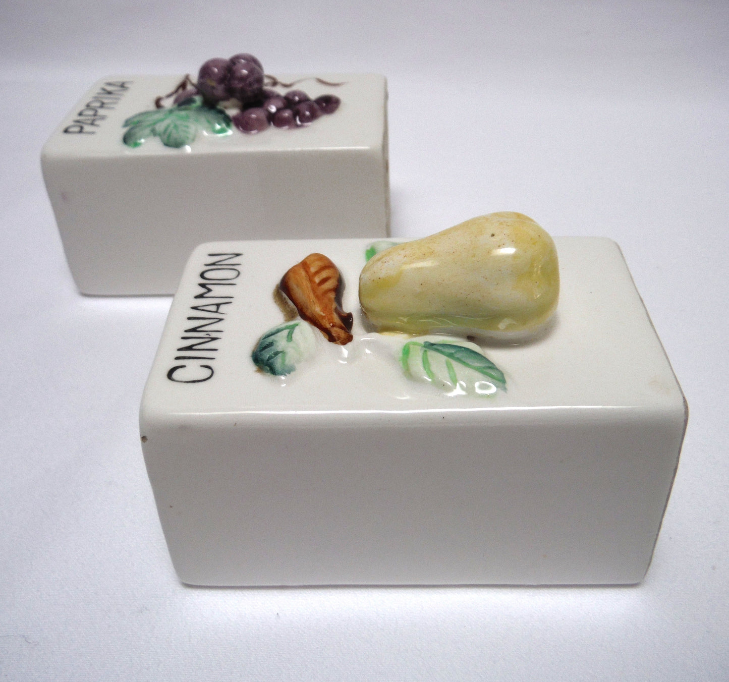 Vintage Pair of Made in Japan White Rectangular Spice Jars with 3-D Design: Cinnamon & Paprika
