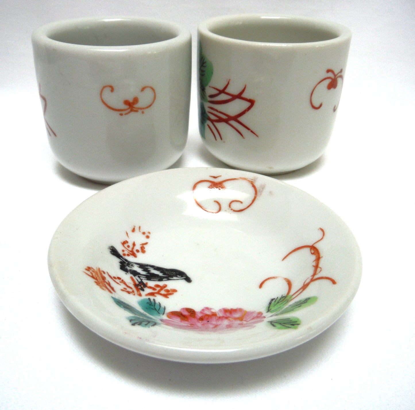 TWO TRADITIONAL CHINESE GREEN-TEA CUPS and ONE SAUCER: In Pink Lotus Flowers with Blackbird and Foliage, distributed by Ming Wo in Vancouver, BC, Canada