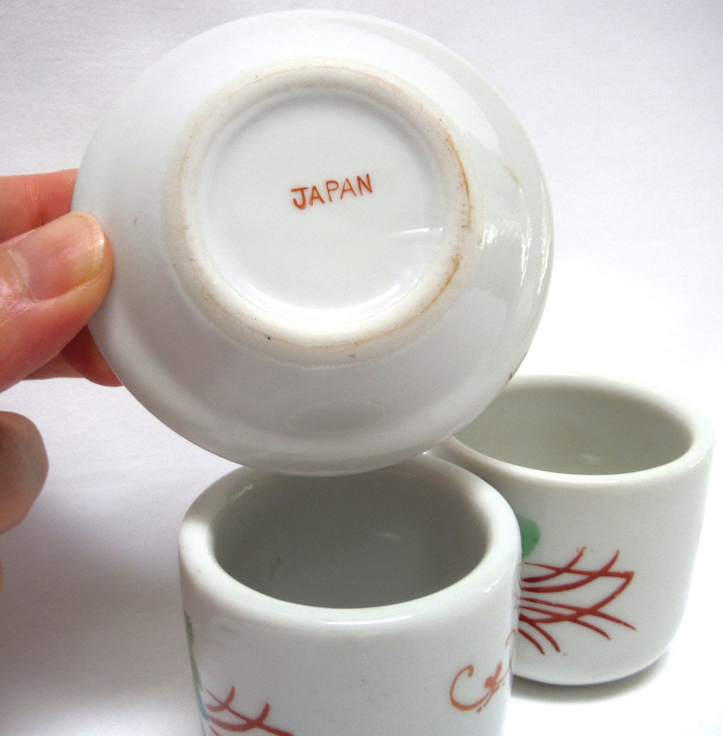 TWO TRADITIONAL CHINESE GREEN-TEA CUPS and ONE SAUCER: In Pink Lotus Flowers with Blackbird and Foliage, distributed by Ming Wo in Vancouver, BC, Canada
