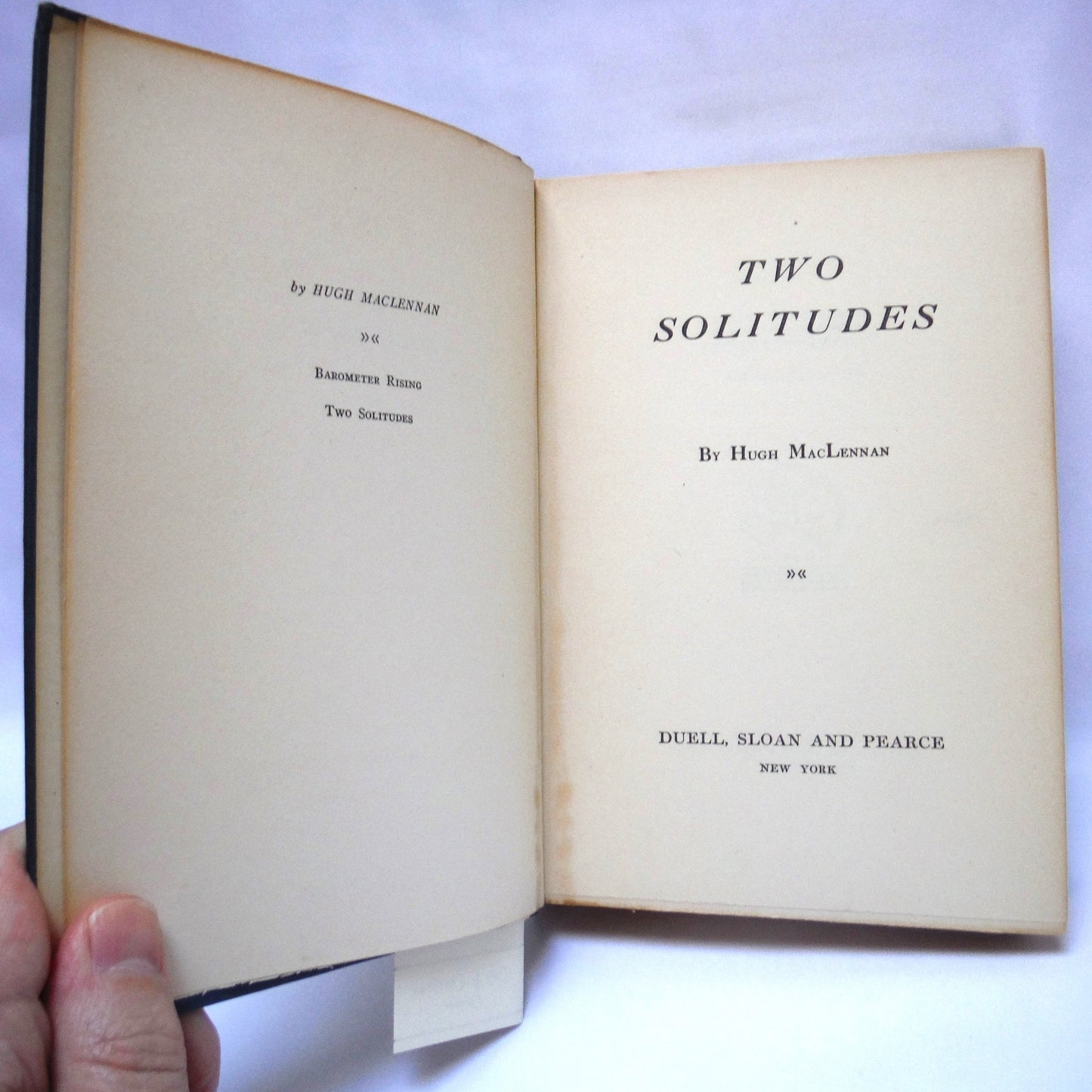 TWO SOLITUDES, by Hugh MacLennan: The RARE Edition by Duell, Sloan and Pearce of New York, USA (1945 1st Ed.)
