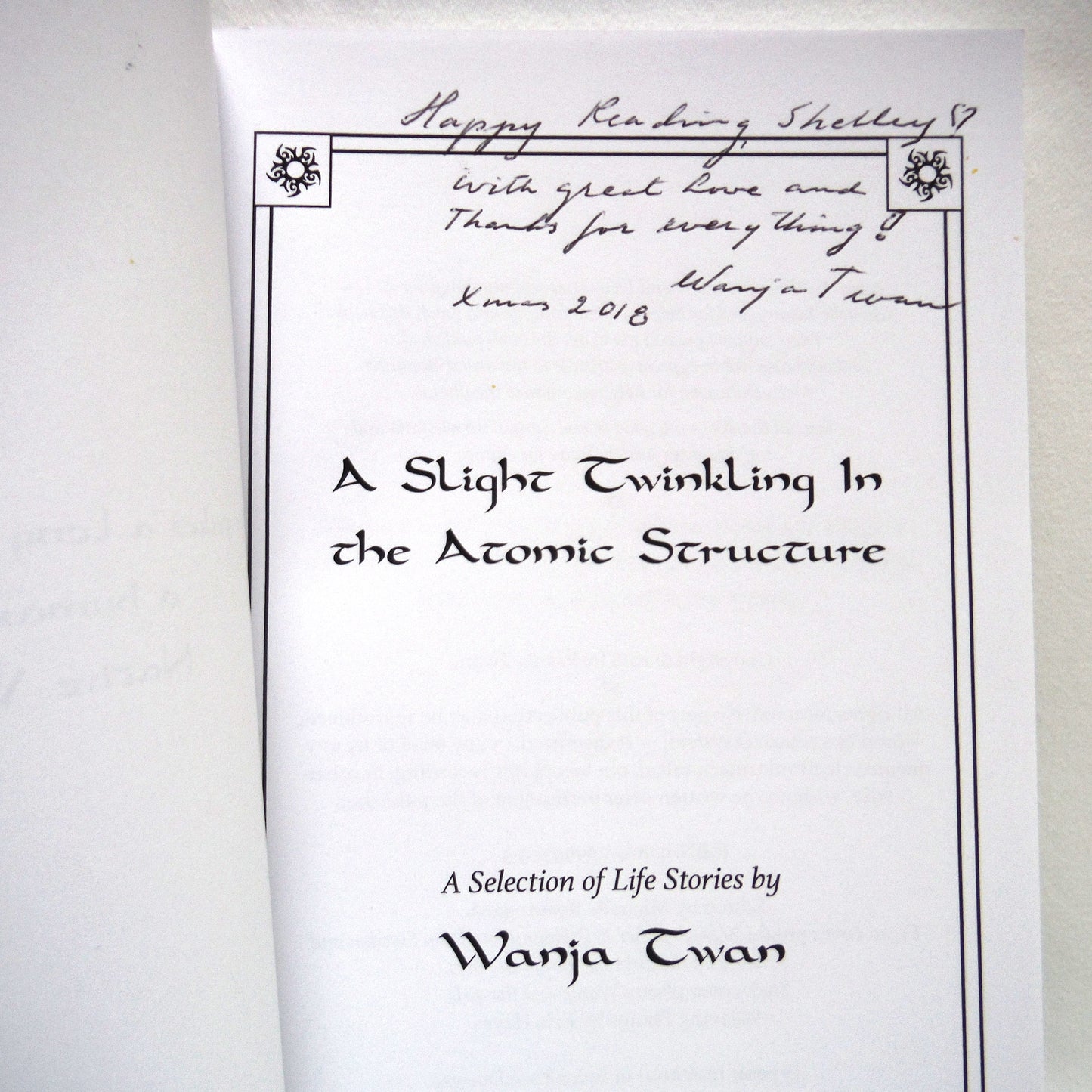 A SLIGHT TWINKLING IN THE ATOMIC STRUCTURE, A Selection of Life Stories by Wanja Twan (1st Ed. SIGNED)