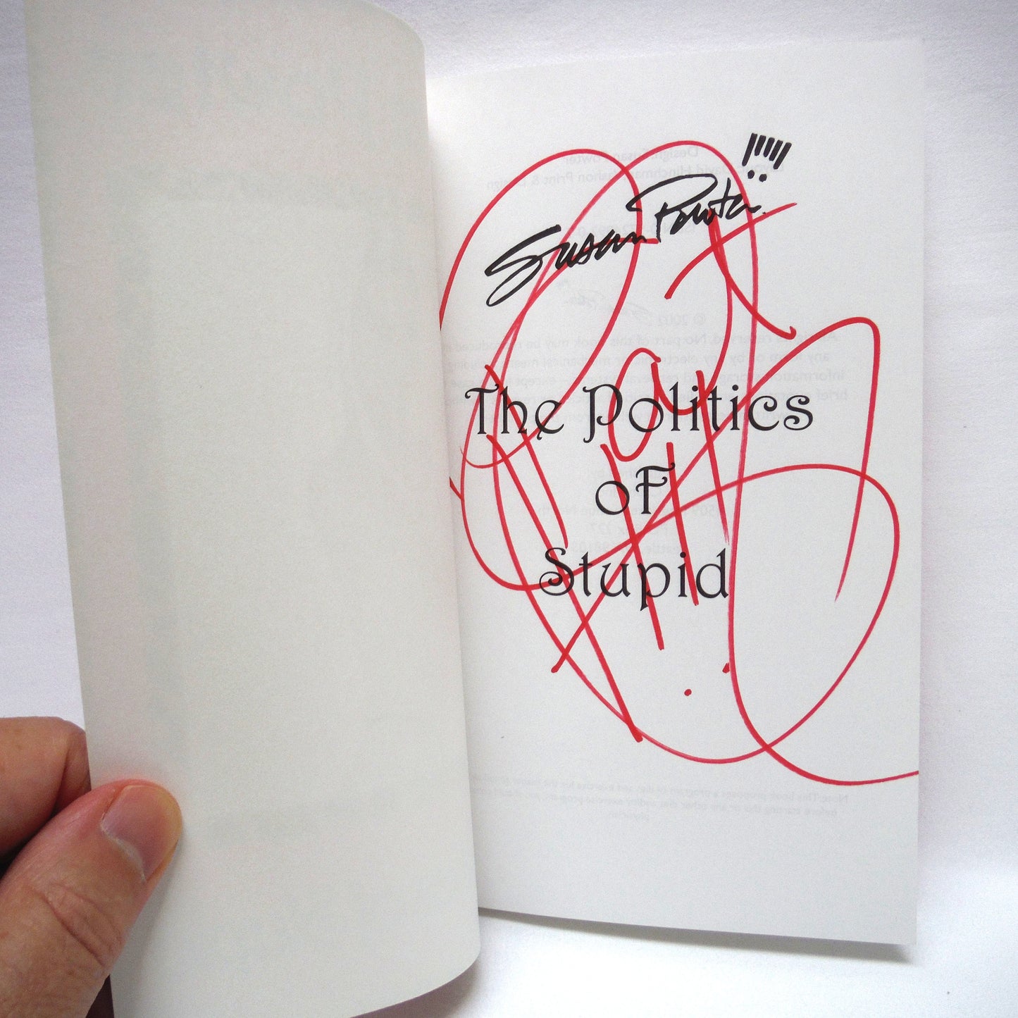 THE POLITICS OF STUPID, by Susan Powter (1st Ed. SIGNED)