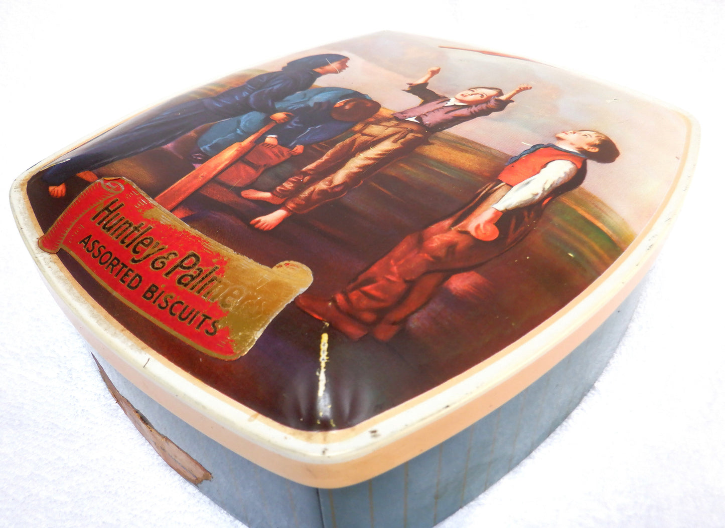 A Famous Antique Biscuit Tin, by HUNTLEY & PALMERS: 'THE CRICKET MATCH TOSS'