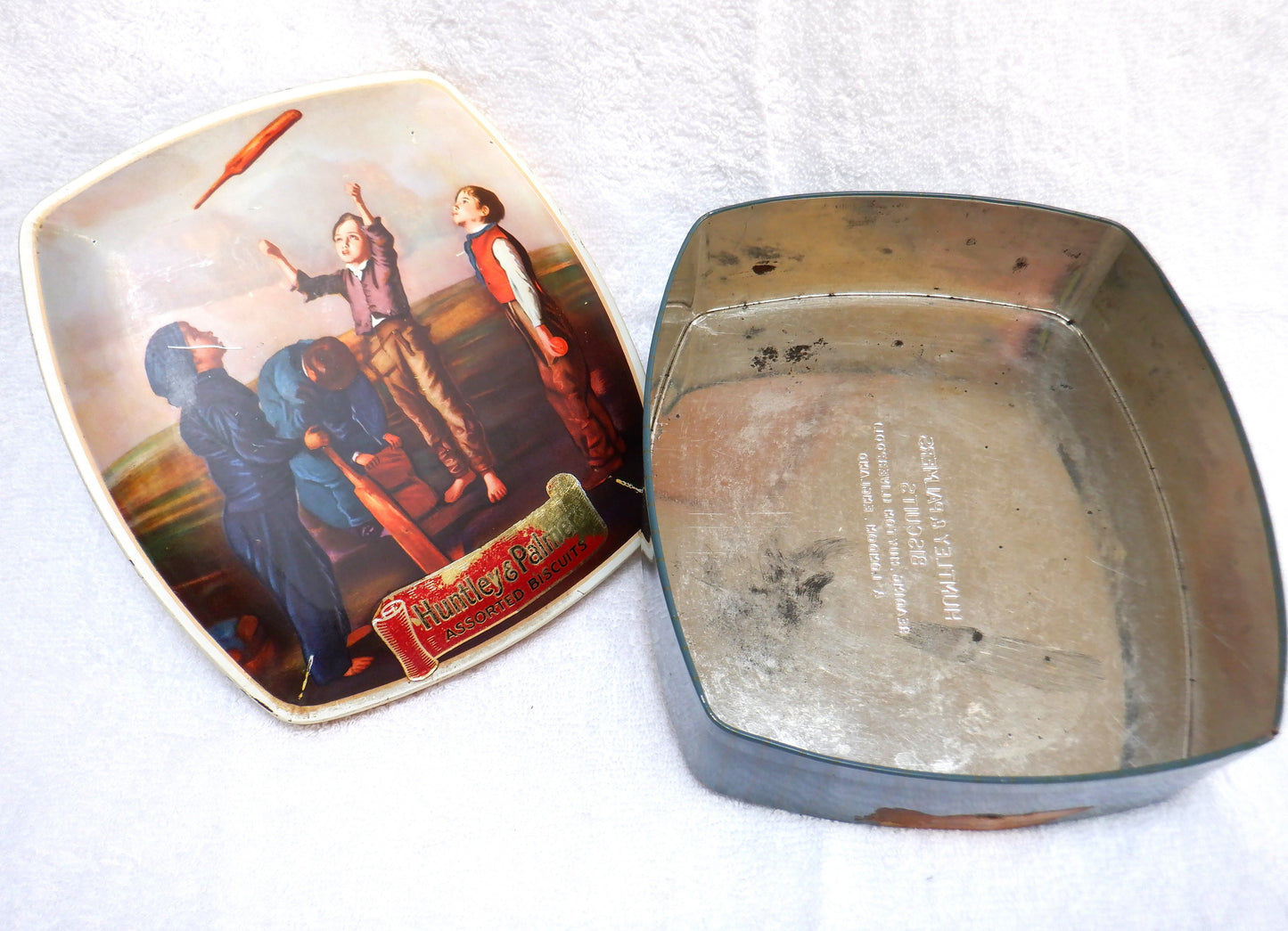 A Famous Antique Biscuit Tin, by HUNTLEY & PALMERS: 'THE CRICKET MATCH TOSS'