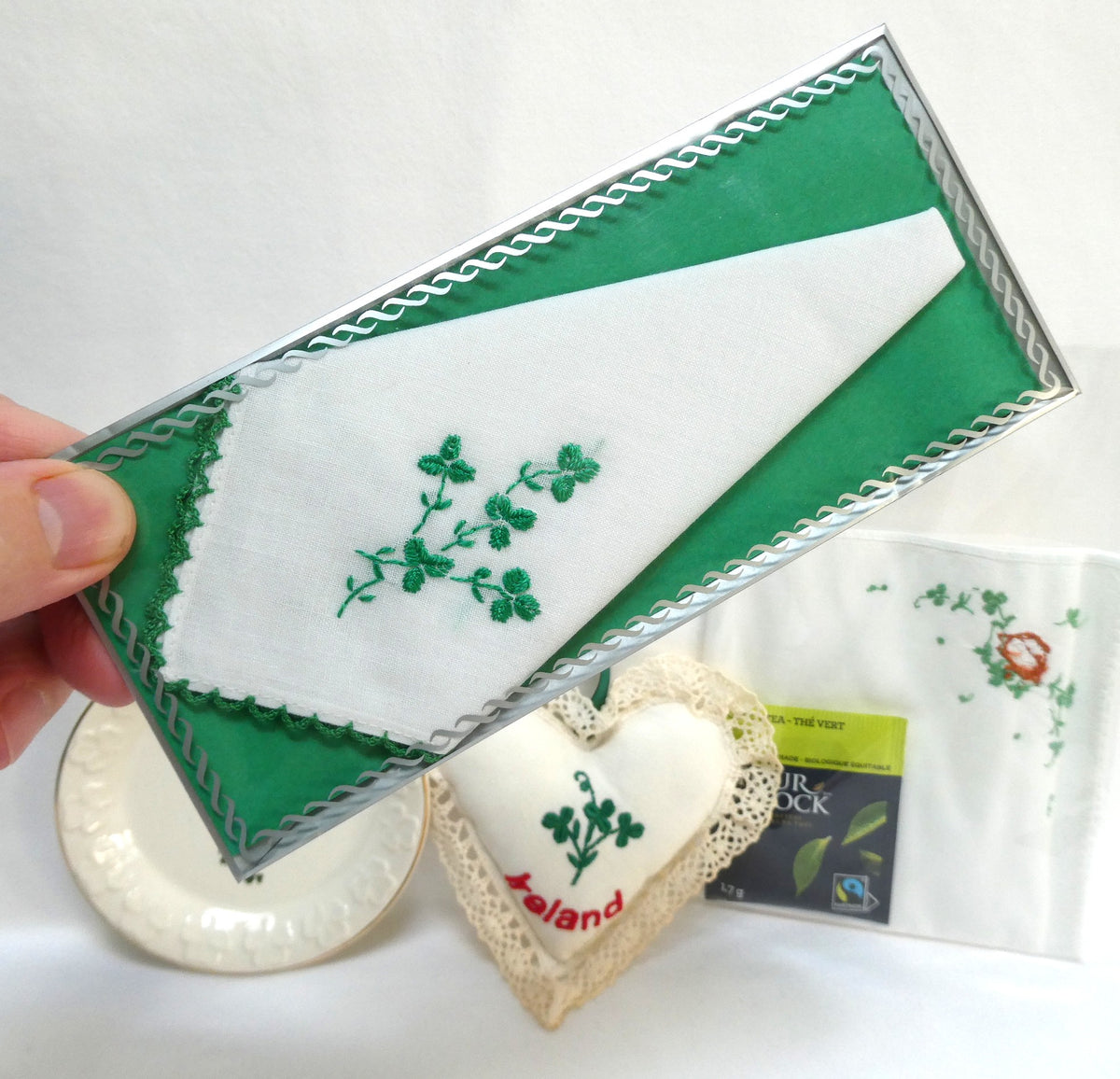 A Collection of Vintage Items Celebrating IRISH ARTS AND CRAFTS: Including Irish Pillow, Shamrock Ceramic Trinket Tray, Embroidered Tea Napkin, and Ladies Linen Handkerchief Set