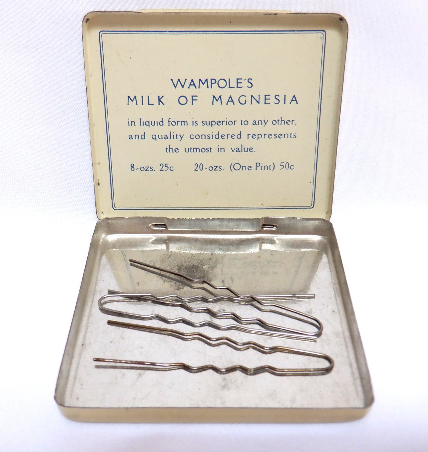 Antique Medicine Tin Container by Henry K. Wampole & Company Limited of Perth, Ontario: WAMPOLE'S MILK OF MAGNESIA