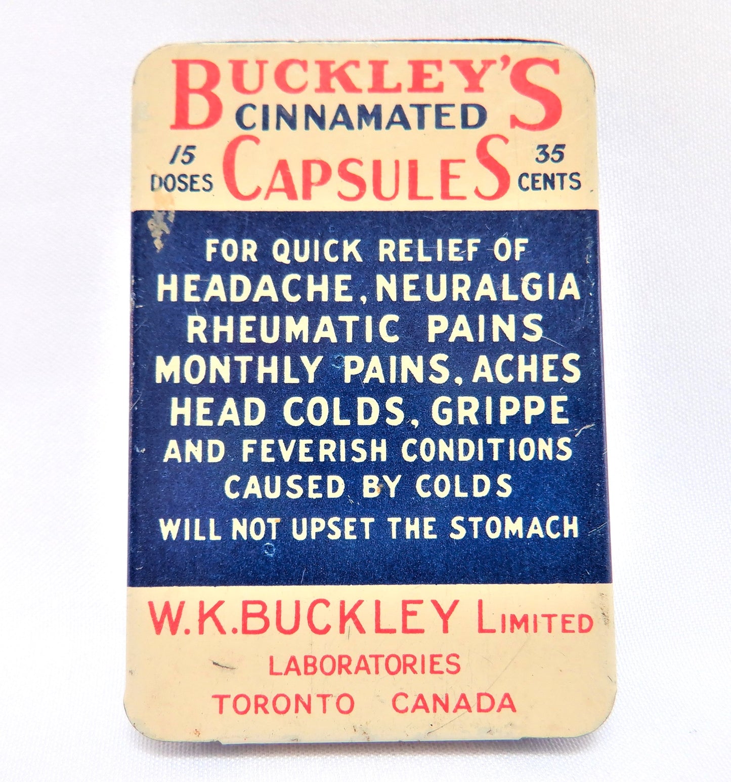 An Antique Canadian Tin Container by BUCKLEY'S CINNAMATED CAPSULES
