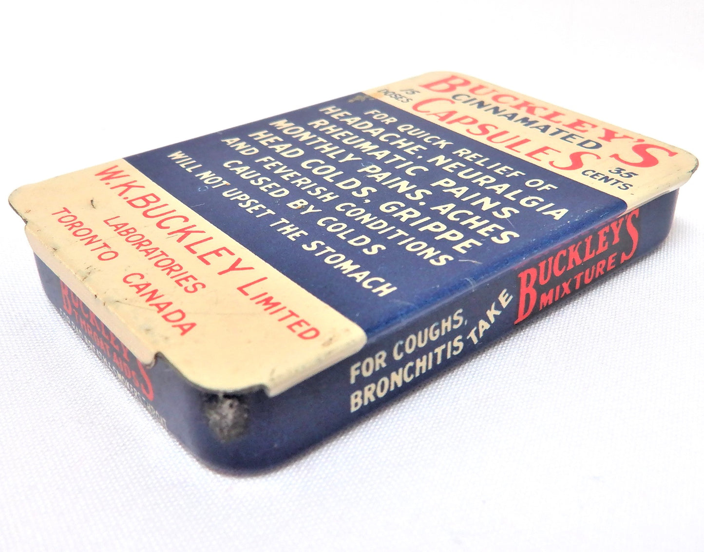 An Antique Canadian Tin Container by BUCKLEY'S CINNAMATED CAPSULES