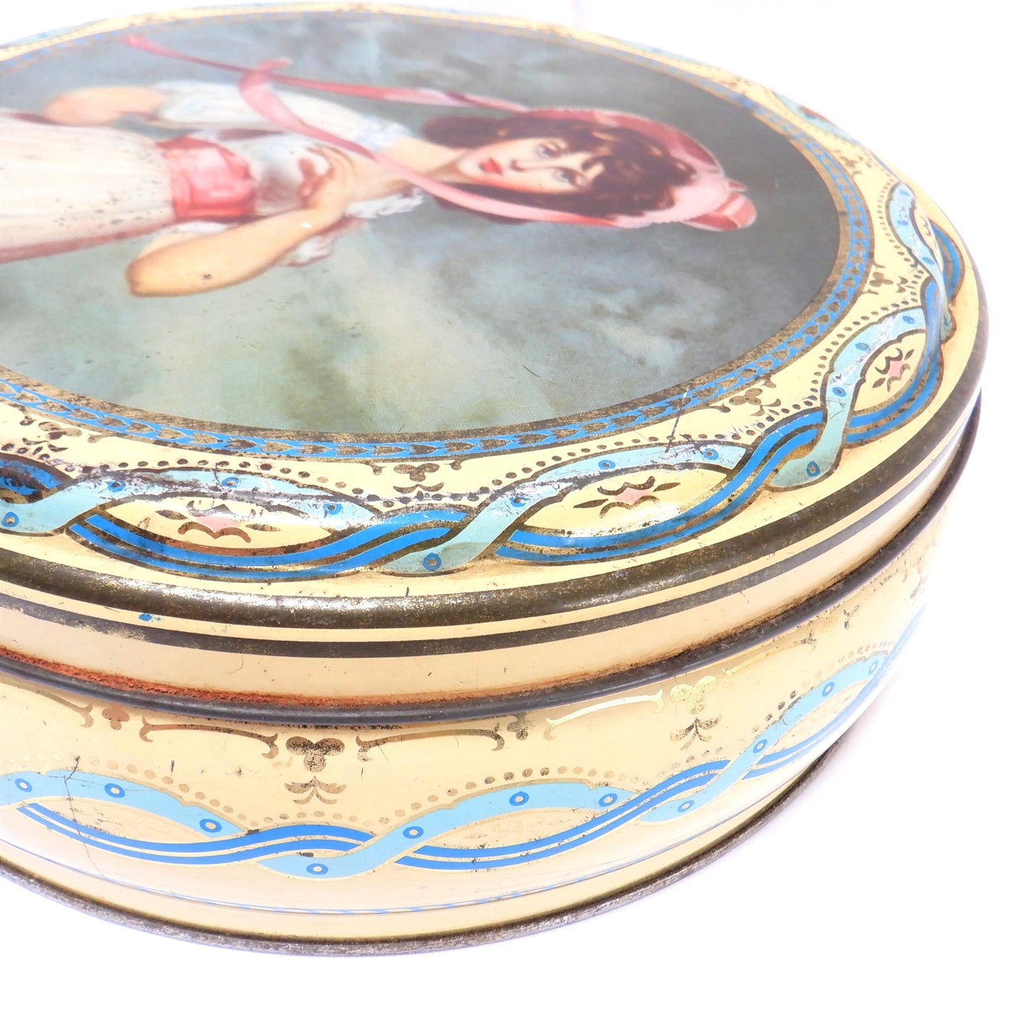 Vintage Tin by PEEK FREAN & COMPANY of London, England: 'Girl in a Pink Bonnet and Sash'