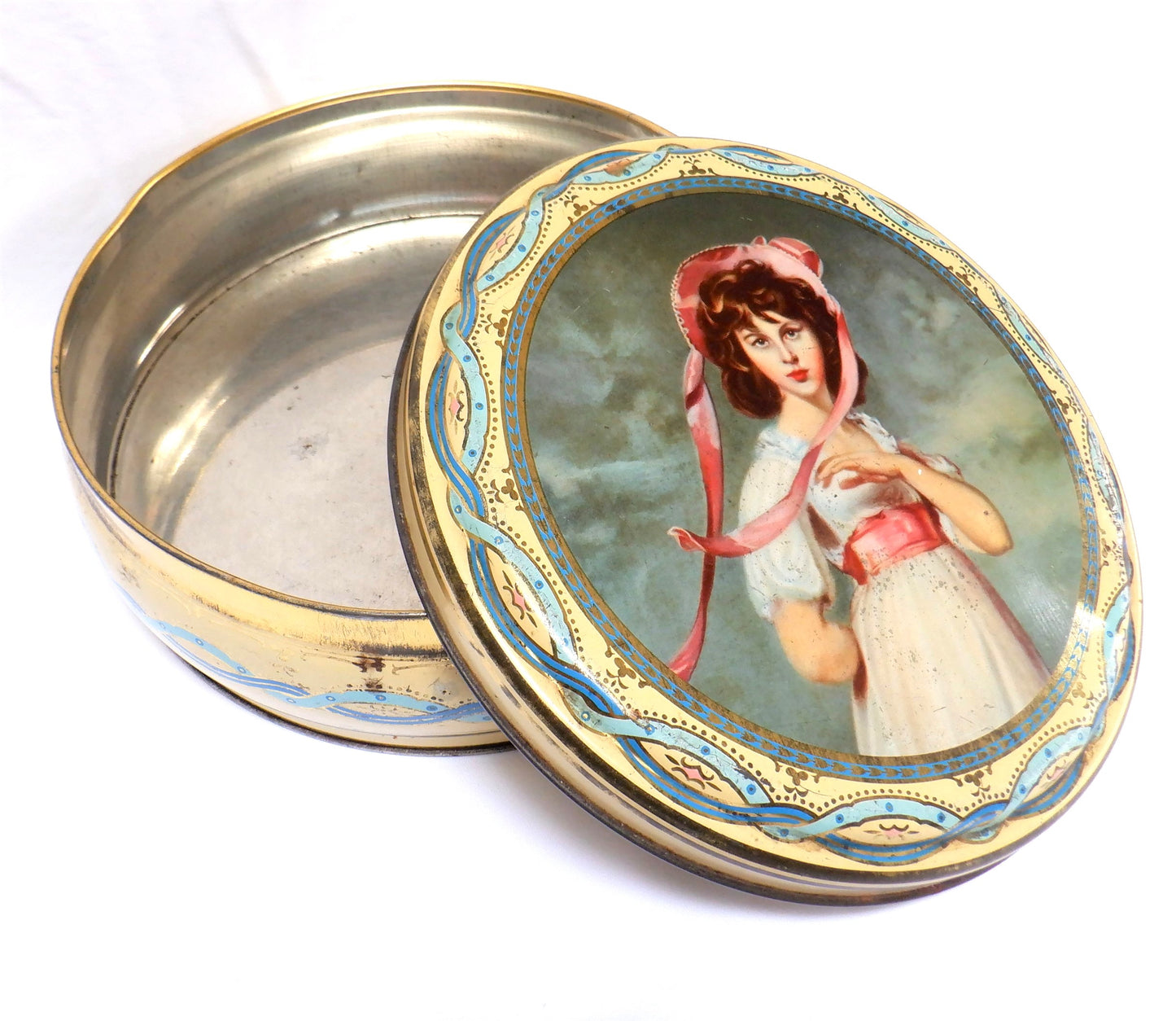 Vintage Tin by PEEK FREAN & COMPANY of London, England: 'Girl in a Pink Bonnet and Sash'