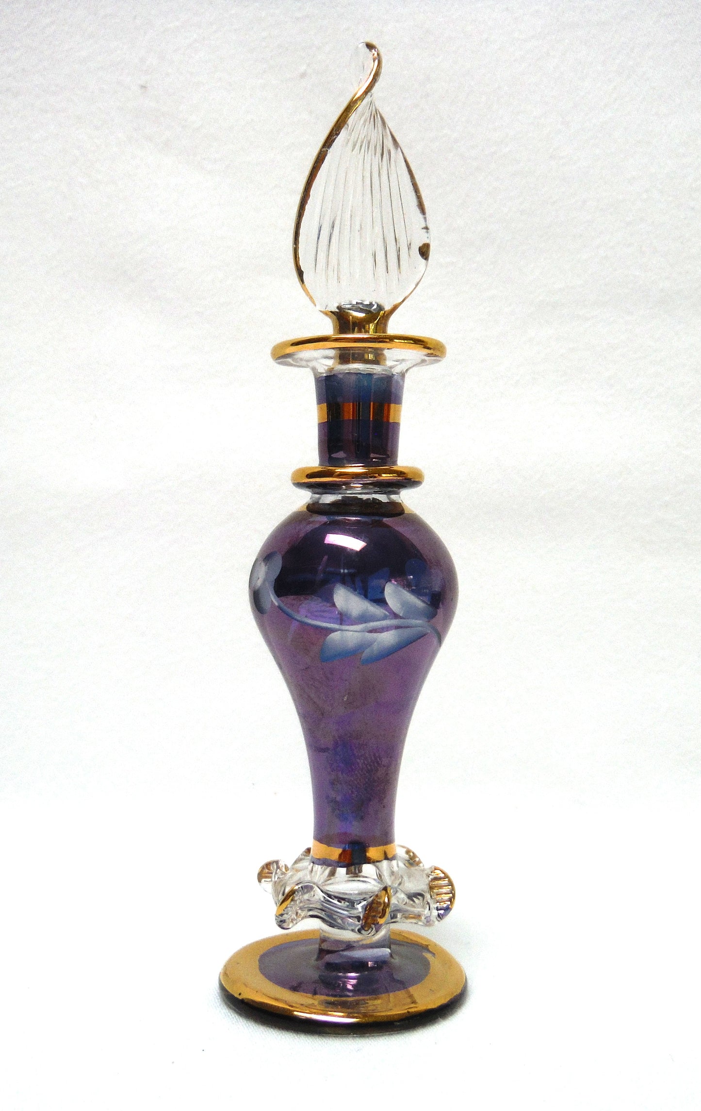 MINIATURE EGYPTIAN PERFUME BOTTLE: 'Nefertitis Tears 18 K gold glided, amethyst toned, mouth blown, hand-cut'