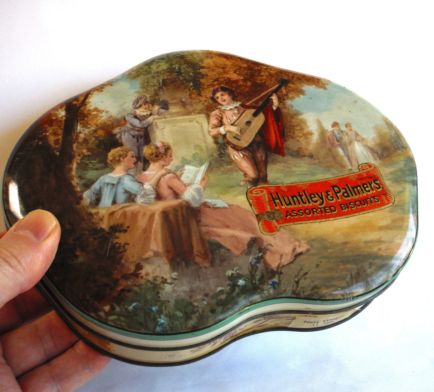 STUNNING ANTIQUE TIN CONTAINER, by Huntley & Palmers Assorted Biscuits of London : "MUSICAL GARDEN GIRLS"