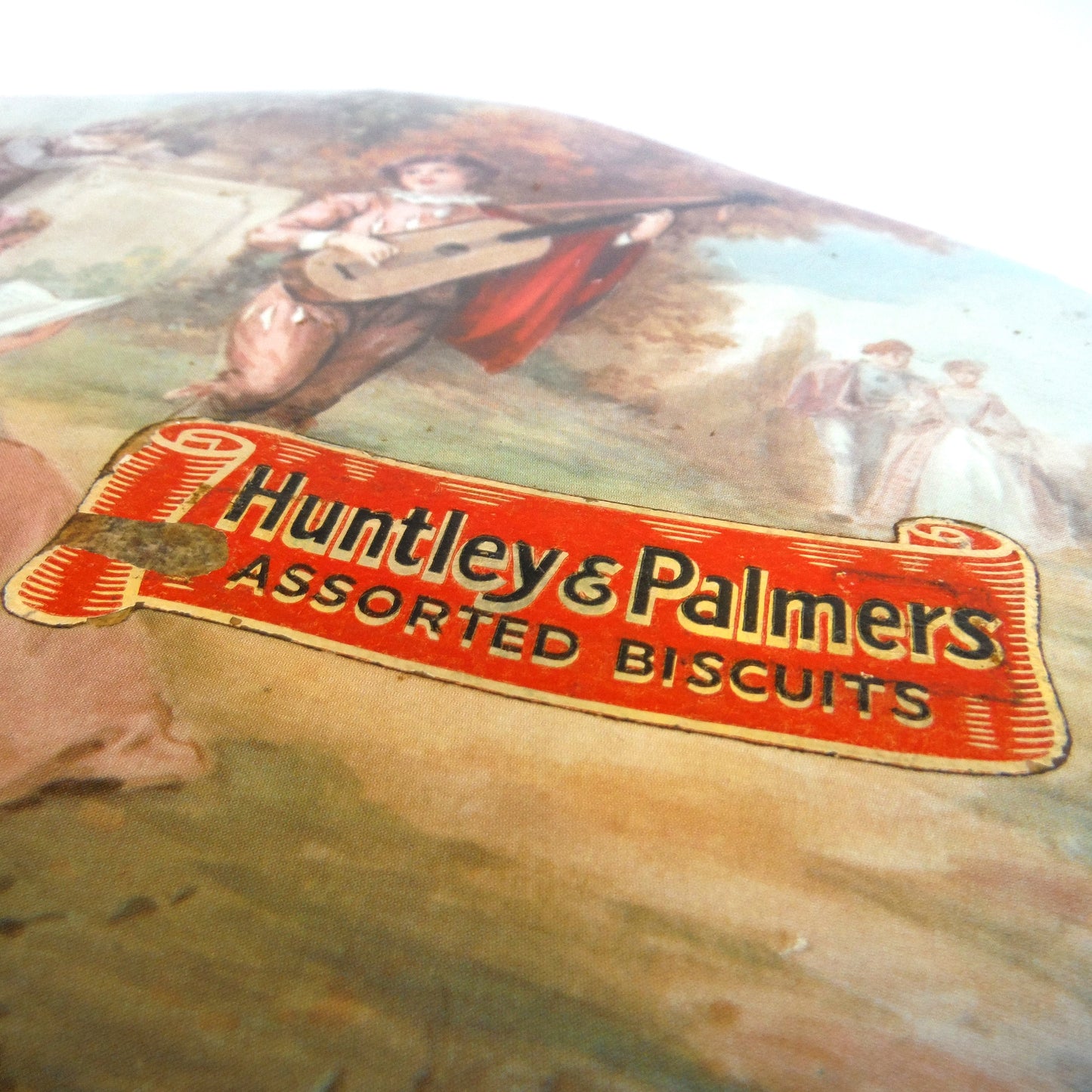STUNNING ANTIQUE TIN CONTAINER, by Huntley & Palmers Assorted Biscuits of London : "MUSICAL GARDEN GIRLS"