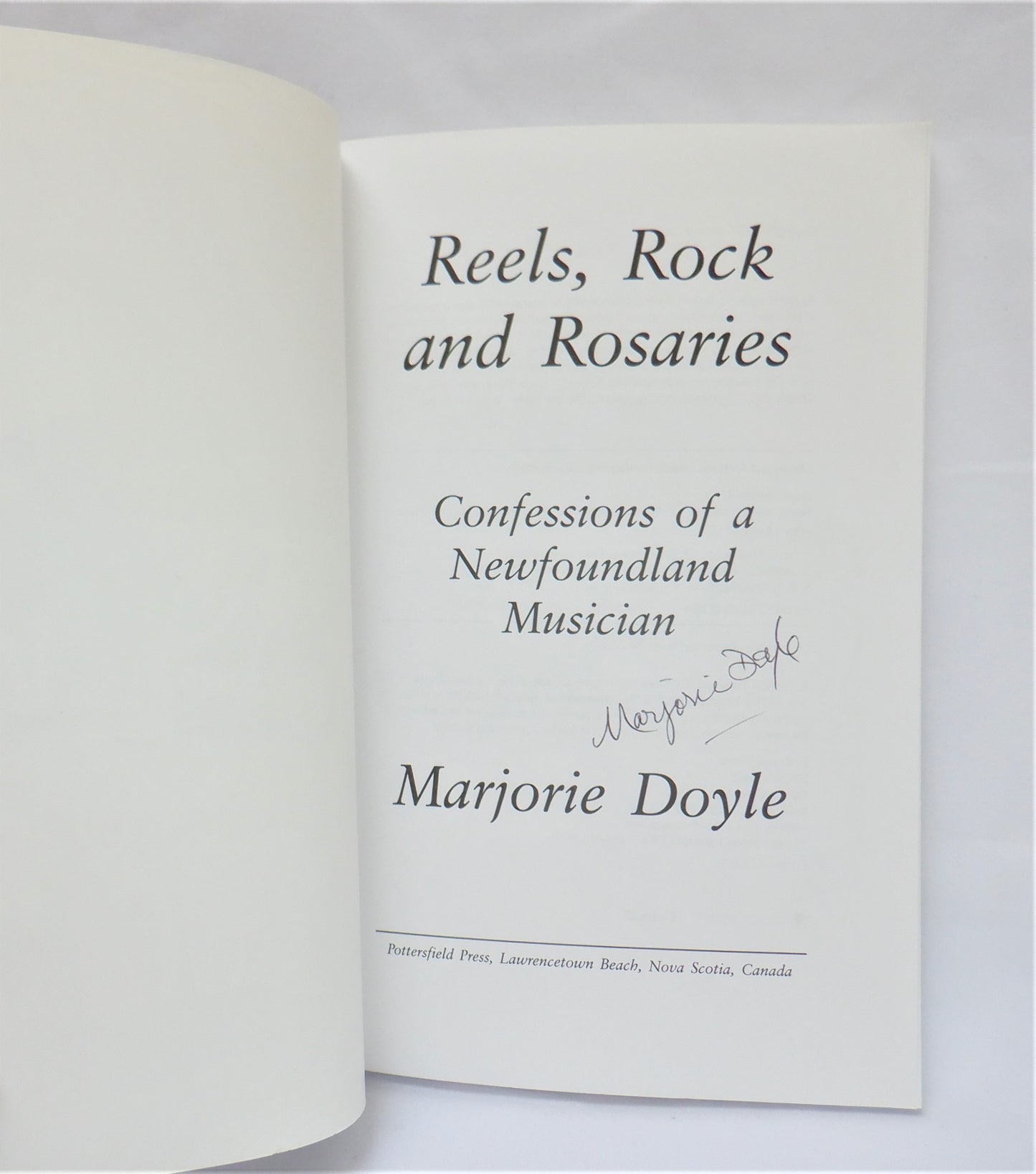 REELS, ROCK and ROSARIES, Confessions of a Newfoundland Musician by Marjorie Doyle (1st Ed. SIGNED)