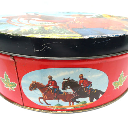 Mid-Century Large Tin Container by PEEK FREAK BISCUITS of London: The Royal Canadian Mounted Police (RCMP) and his Majestic Steed!
