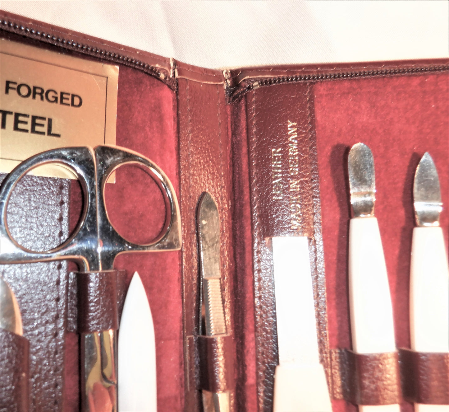 Vintage BRAND NEW TRAVEL MANICURE SET, 11-piece Burgundy-Leather Zipper-Case, Made in Germany