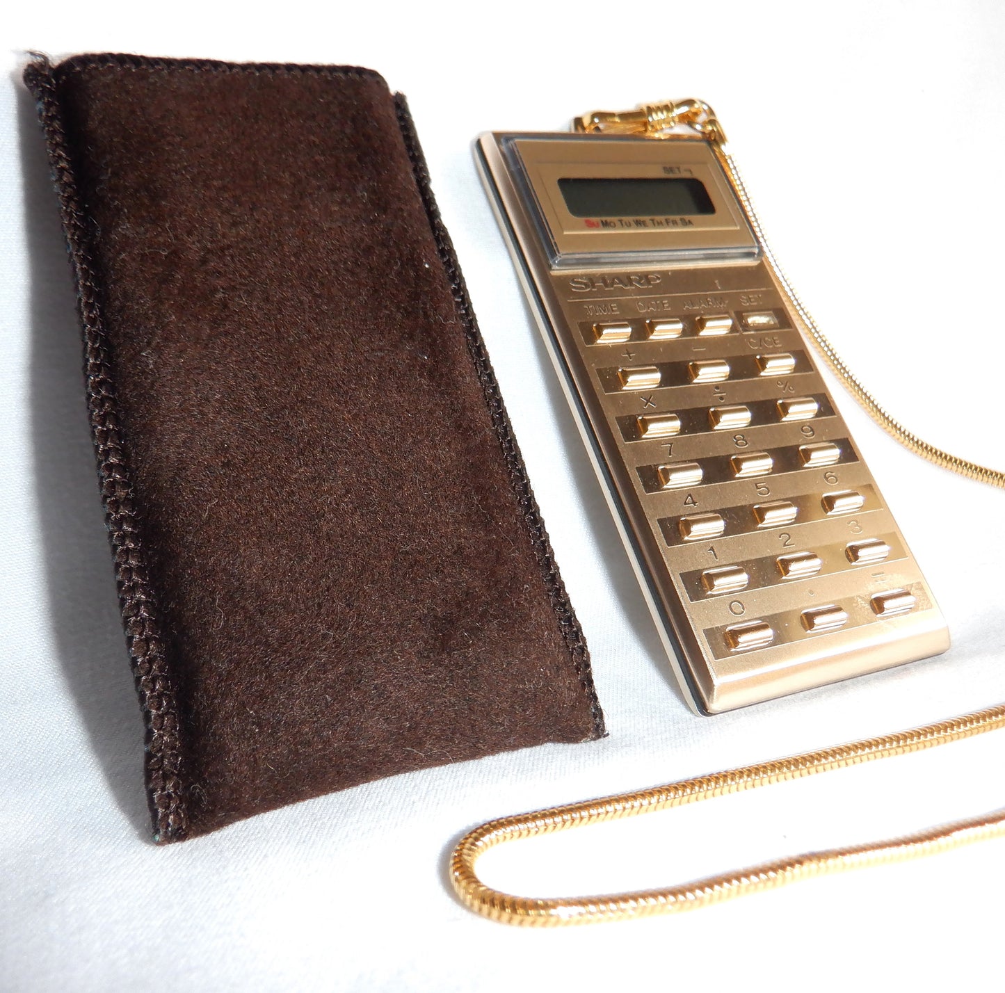 VINTAGE SHARP POCKET CALCULATOR, Model EL-8061S, MINT Condition w/chain, clasp, key & case! Made in Japan 1980's