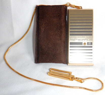 VINTAGE SHARP POCKET CALCULATOR, Model EL-8061S, MINT Condition w/chain, clasp, key & case! Made in Japan 1980's