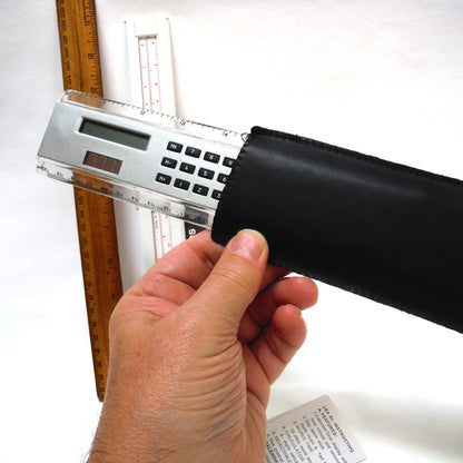 TRIO OF MEASURING DEVICES THROUGH THE AGES: Wood Ruler, Slide Ruler, and Electronic Ruler
