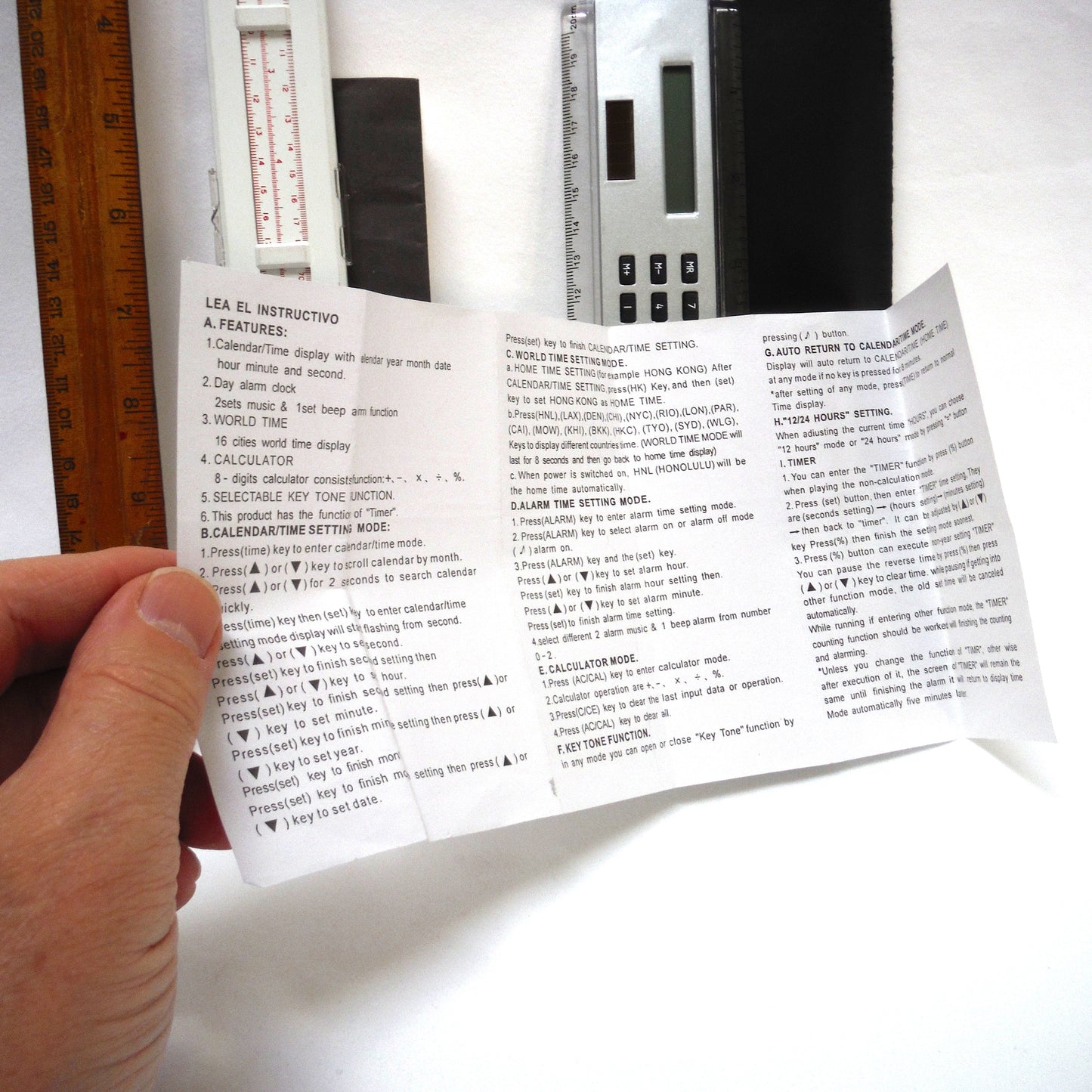 TRIO OF MEASURING DEVICES THROUGH THE AGES: Wood Ruler, Slide Ruler, and Electronic Ruler
