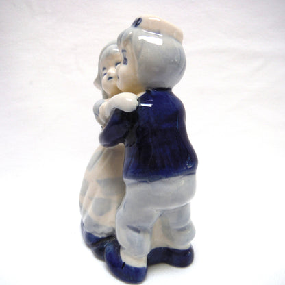 VINTAGE STATUE OF DUTCH COUPLE HUGGING OR DANCING, Hand Painted by DELFT BLUE