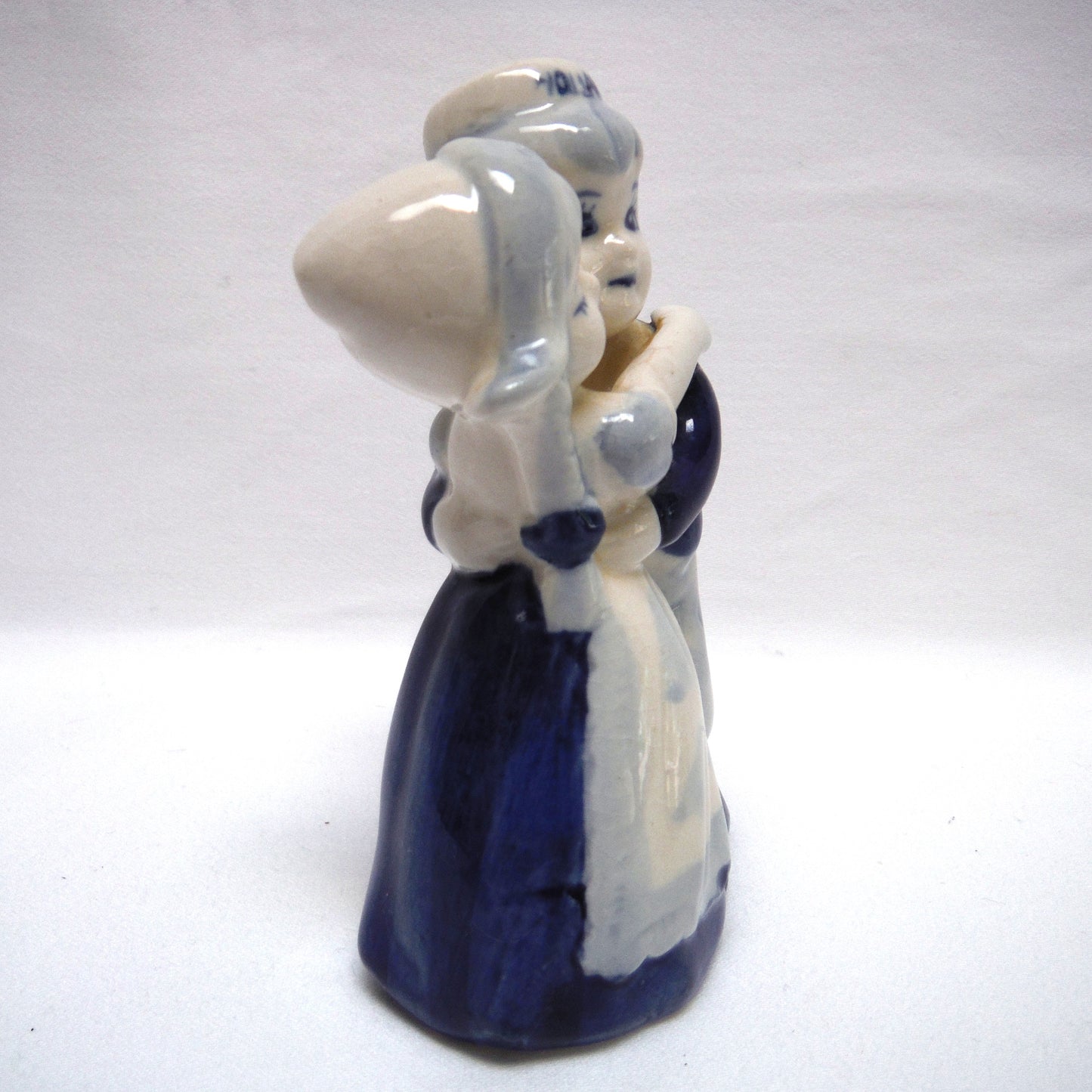 VINTAGE STATUE OF DUTCH COUPLE HUGGING OR DANCING, Hand Painted by DELFT BLUE