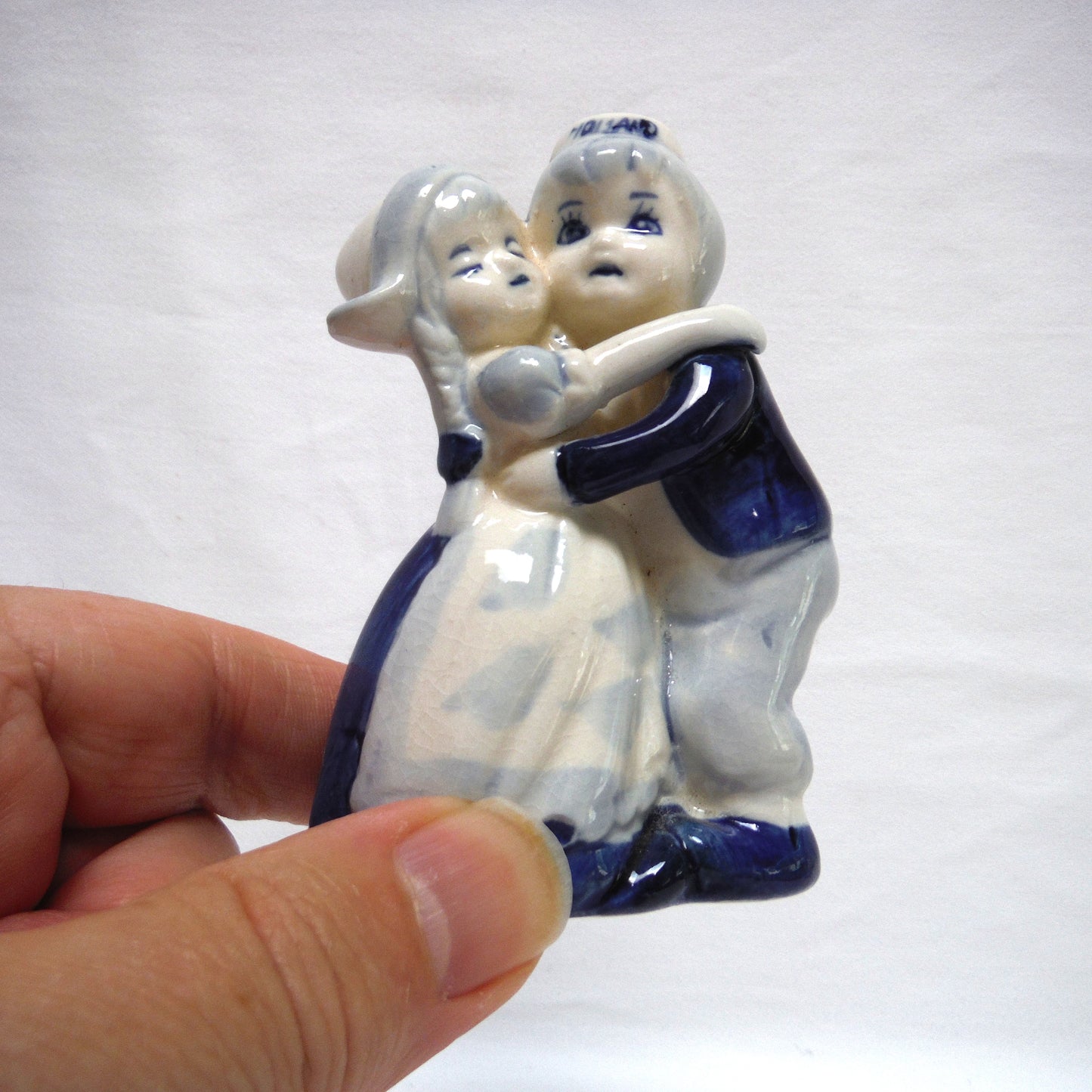 VINTAGE STATUE OF DUTCH COUPLE HUGGING OR DANCING, Hand Painted by DELFT BLUE