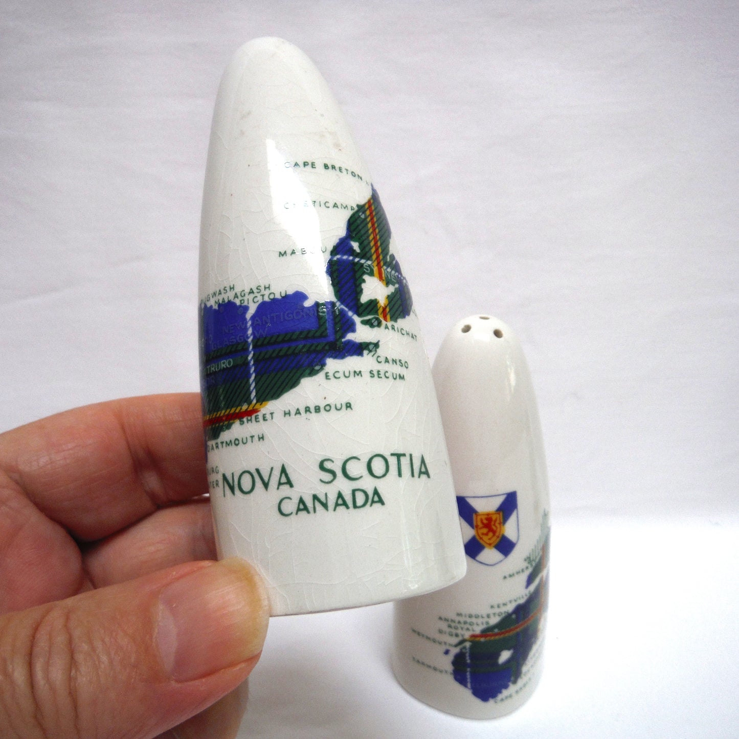 PAIR OF MID-CENTURY NOVA SCOTIA SALT & PEPPER CERAMIC SHAKERS: Featuring the NS Canada Map and Flag Imprint with Original Plugs!