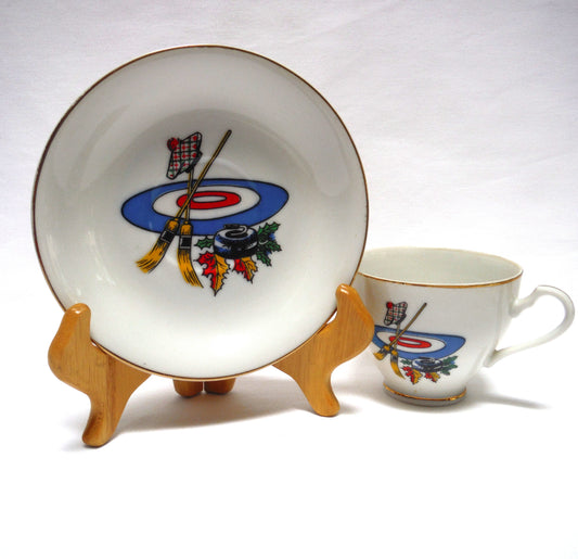 RARE VINTAGE CURLING MOTIF GOLD RIMMED TEA CUP & SAUCER, Designed in Canada, Made in Japan