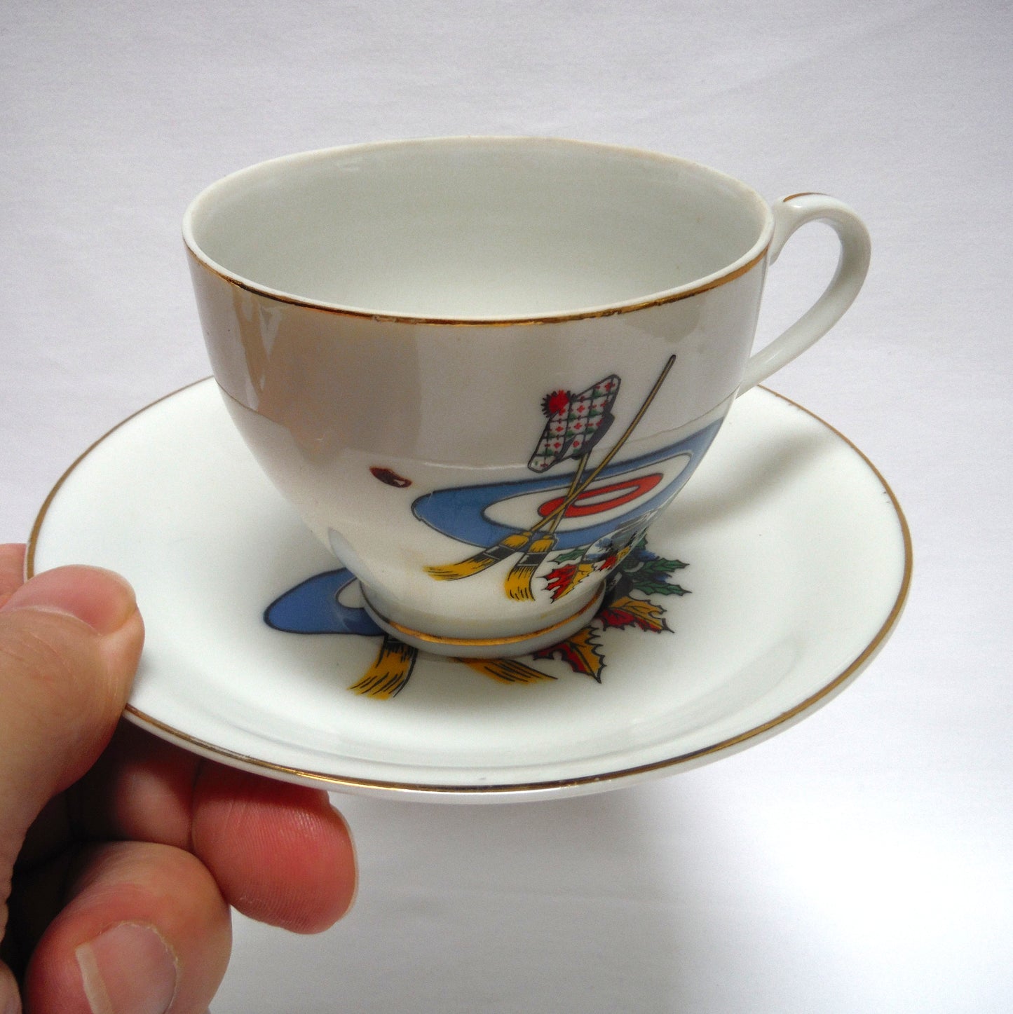 RARE VINTAGE CURLING MOTIF GOLD RIMMED TEA CUP & SAUCER, Designed in Canada, Made in Japan
