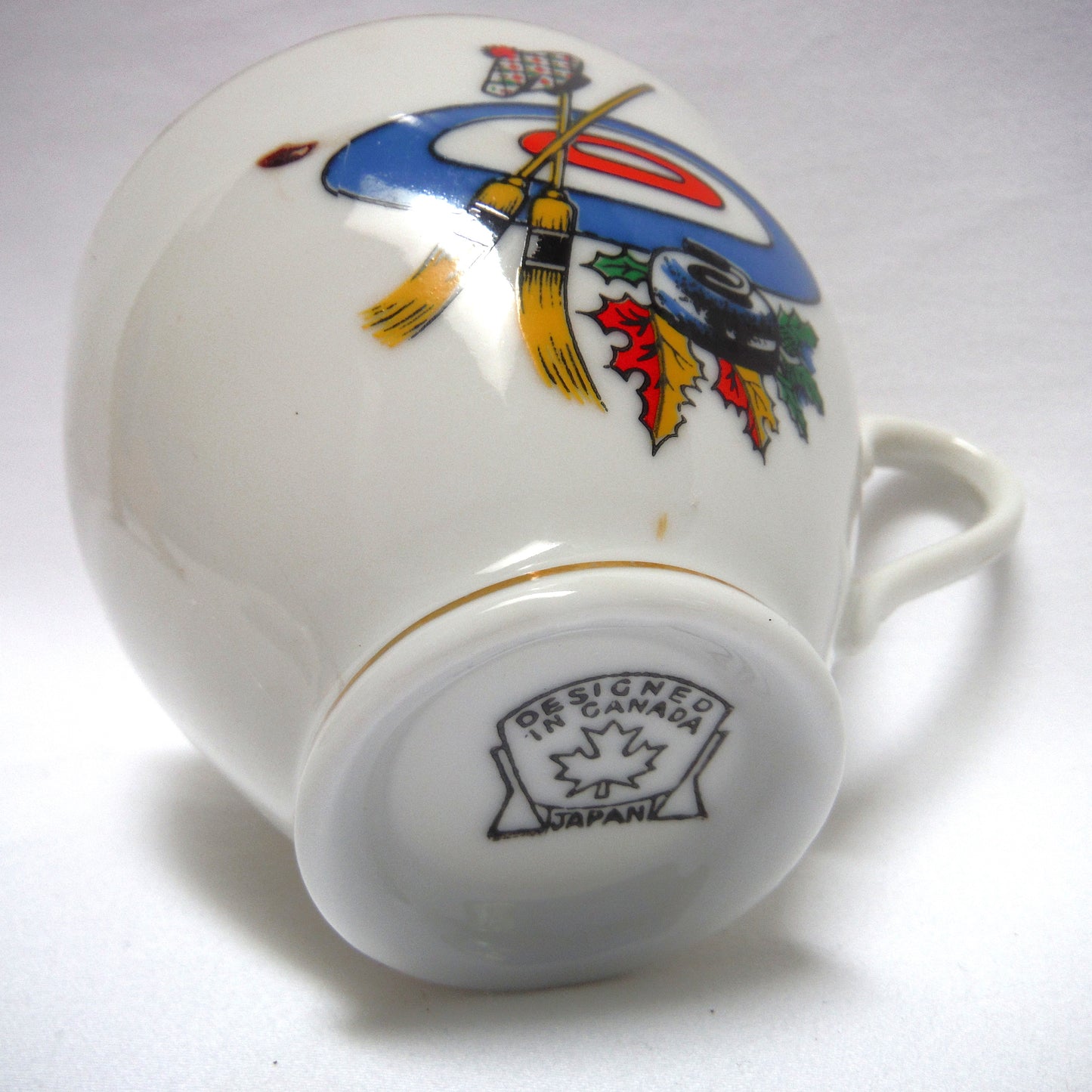 RARE VINTAGE CURLING MOTIF GOLD RIMMED TEA CUP & SAUCER, Designed in Canada, Made in Japan