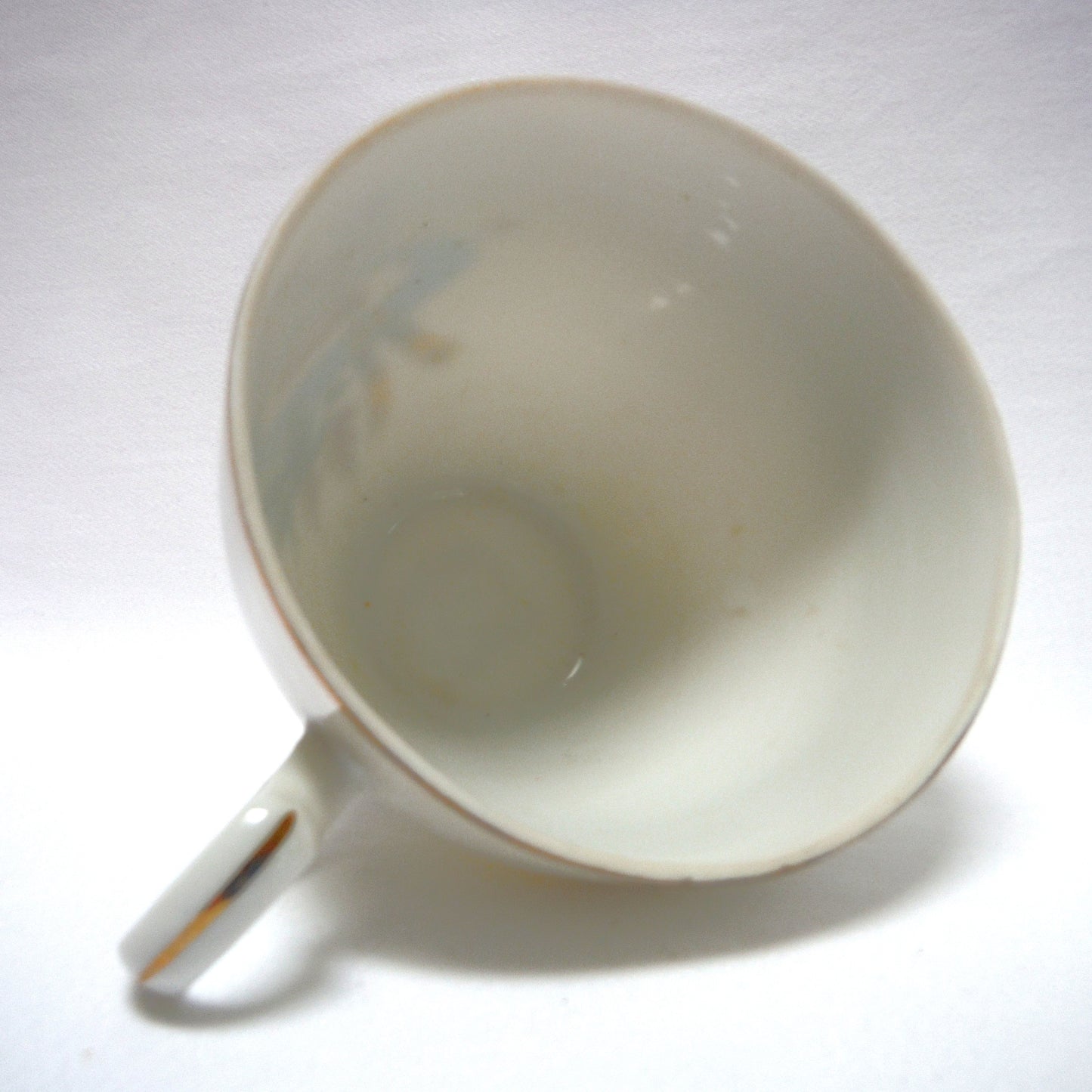 RARE VINTAGE CURLING MOTIF GOLD RIMMED TEA CUP & SAUCER, Designed in Canada, Made in Japan