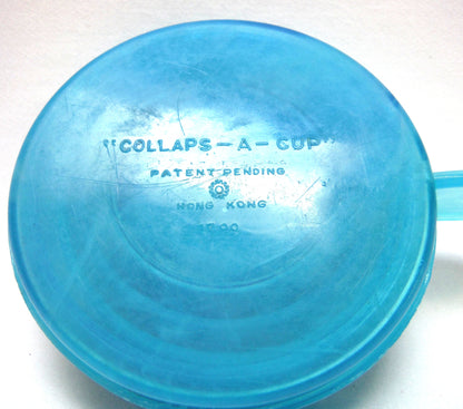 Vintage Portable Collapsing Travel Mug in Turquoise Blue: ROYAL CANADIAN MOUNTED POLICE, by "Collaps-A-Mug" of Hong Kong